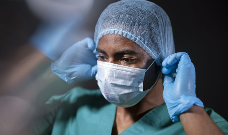 close up doctor wearing mask